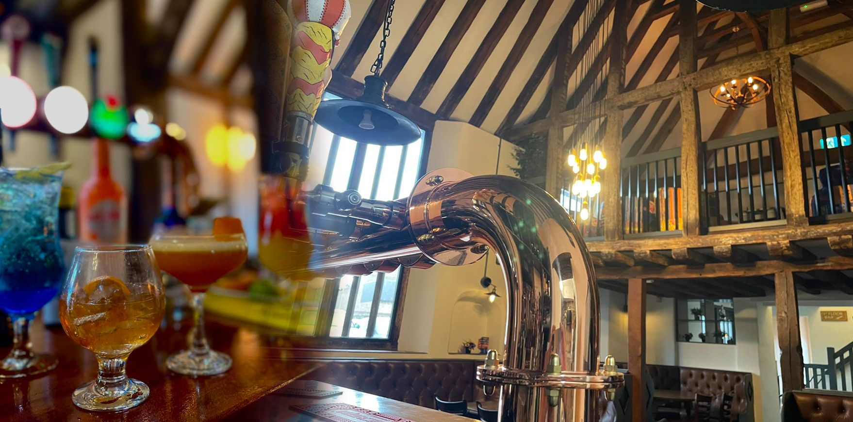 Relax and sip on cocktails and ales in our comfy snugs